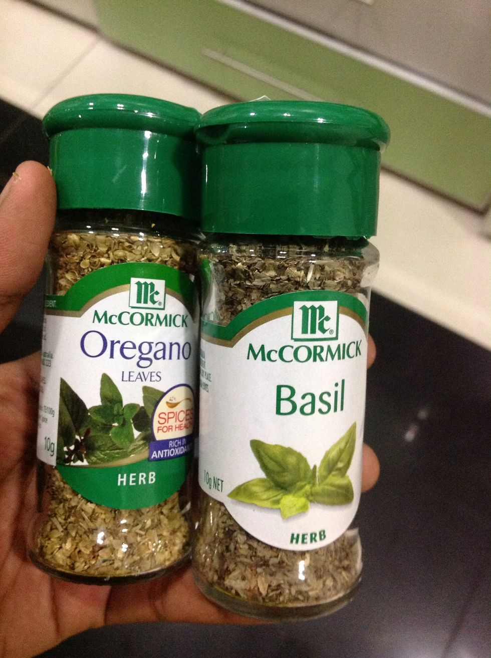 Once the meat sauce is done, get your herbs. Fresh herbs would be great! But I didn't have any... So dried would work as well. I actually always use dried herbs.