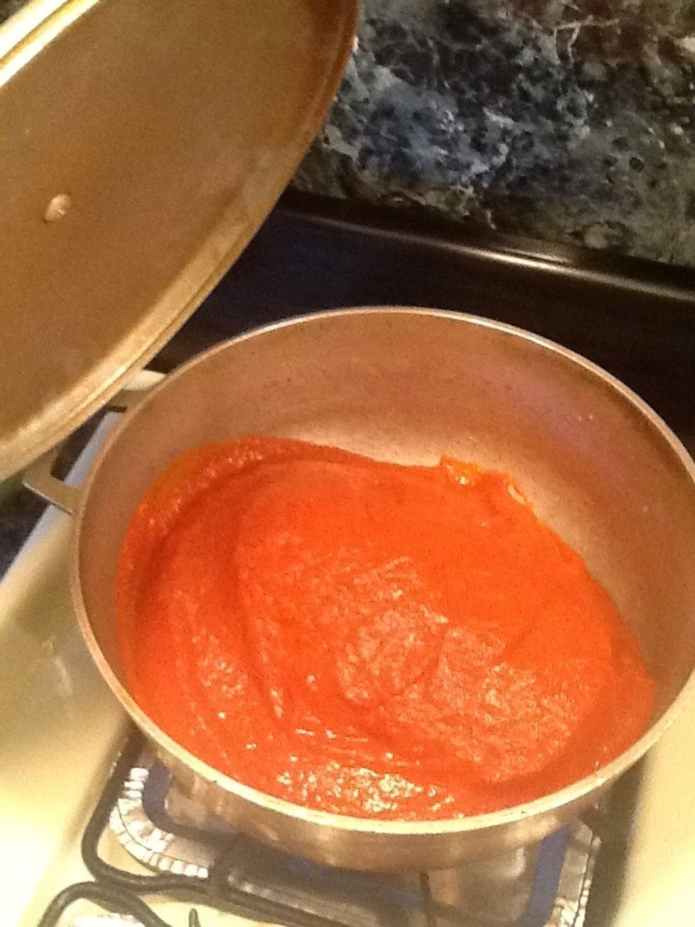 Once the meatloaf has been covered you will take the pot and set it on the stove over low heat. Cover the pot and cook it for 25-30 minutes