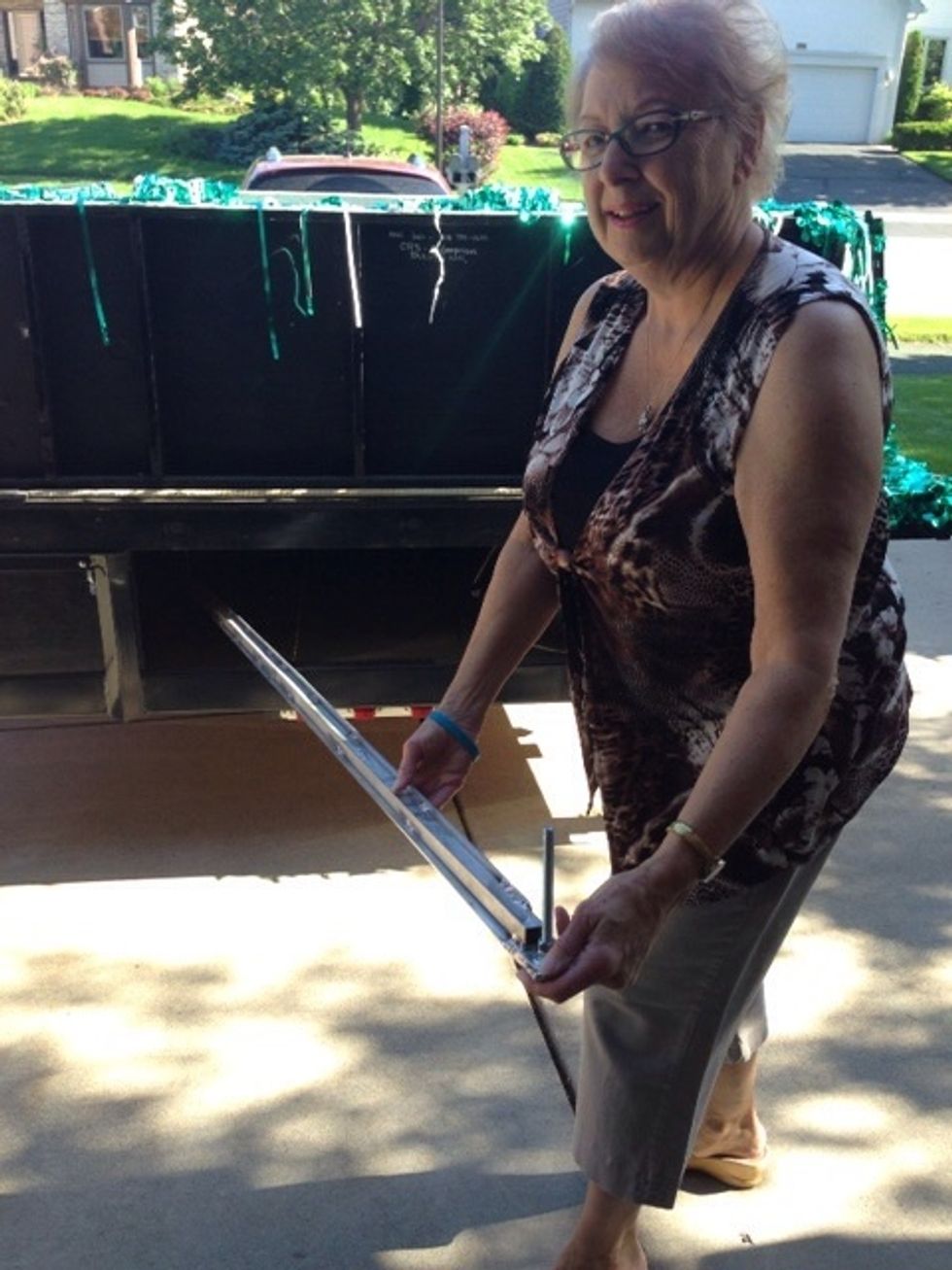 Once the metal bars are removed, they can be stored in the cubby underneath the float.
