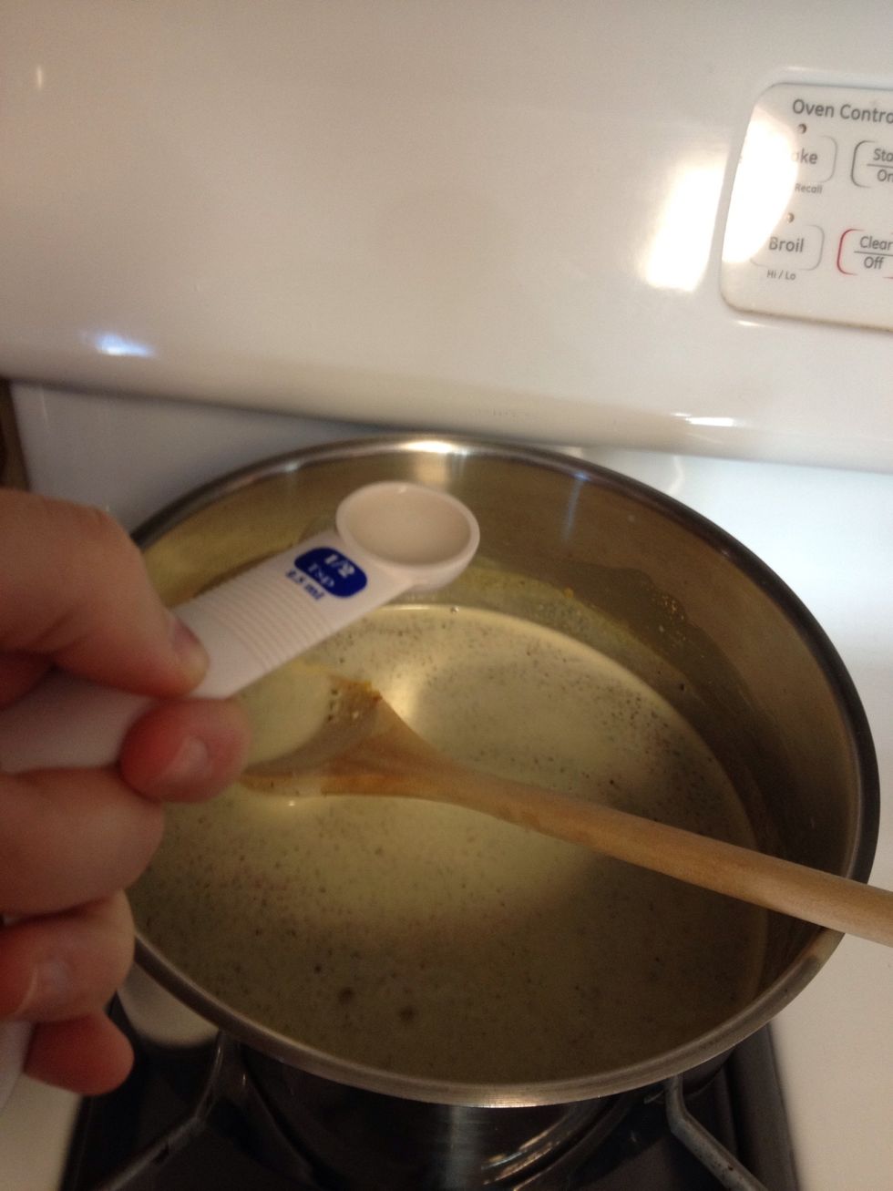 Once the milk boils, add the almond extract and remove the pot from the heat