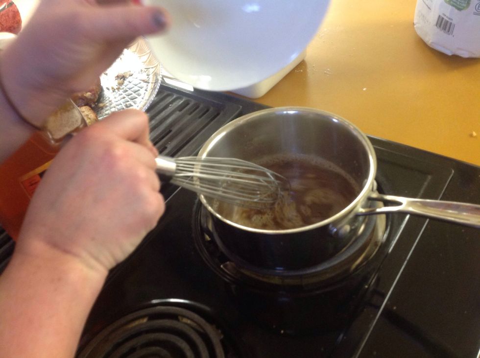 Once the mix starts to boil SLOWLY in an even stream whisk in the slurry. Once the slurry is mixed in keep whisking until the mixture is thickened, about 1-2 minutes. Keep the heat on medium low.