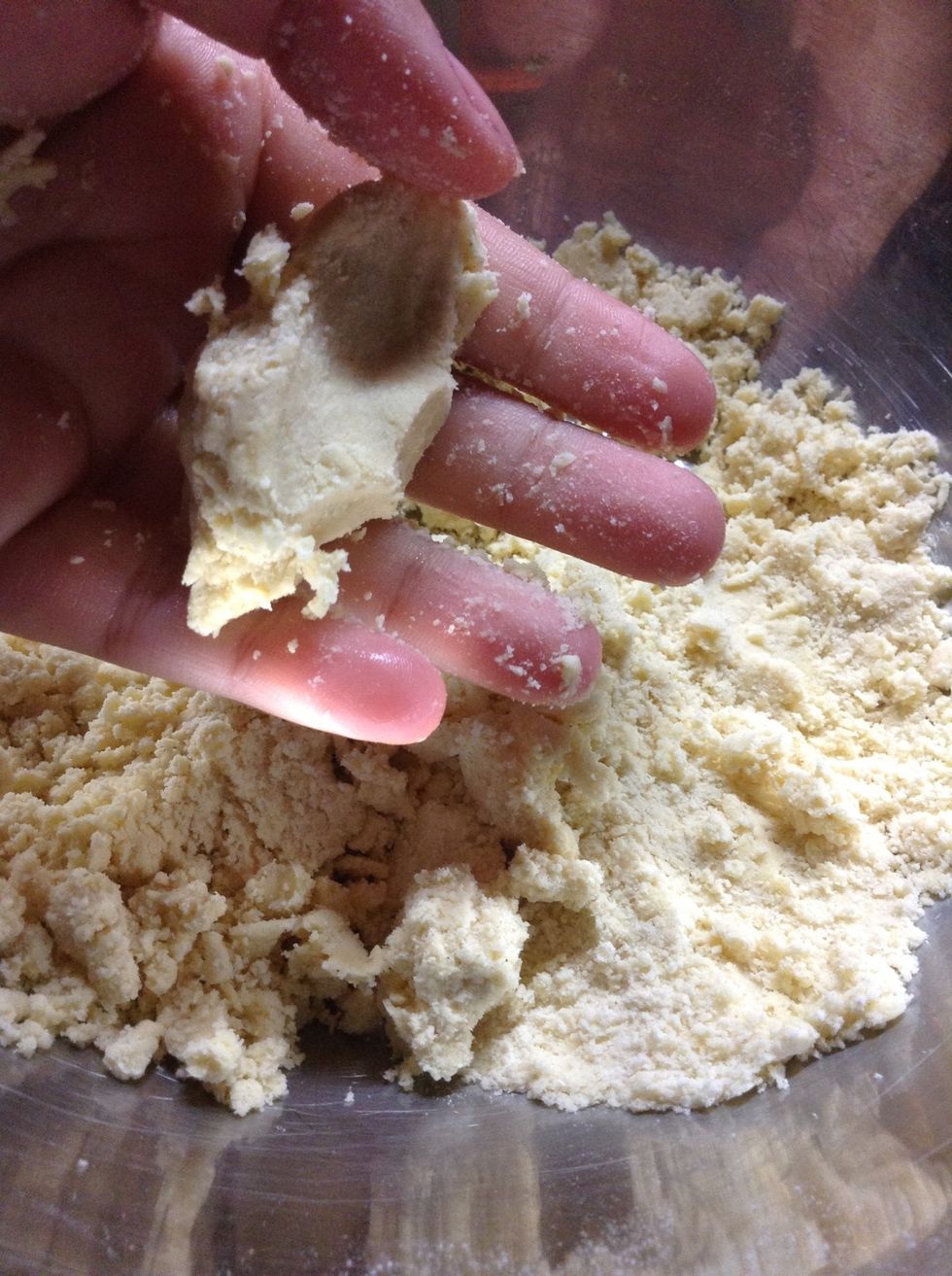 Once the mix stops sticking everywhere and starts having a more solid volume, you are done.  It will still have a little texture but that is totally fine.