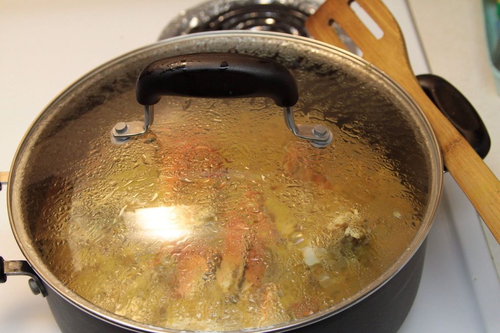 Once the mixture boils had the crab to the pot