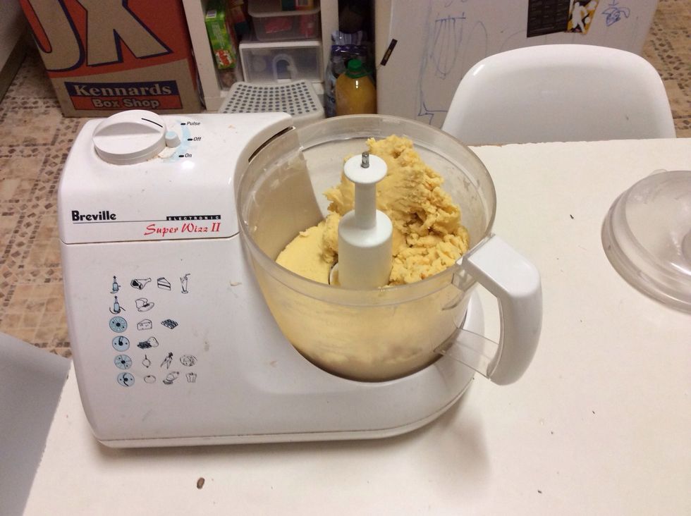 Once the mixture has formed a pastry dough, divide the mixture into 2, then knead each part of dough into flat discs.