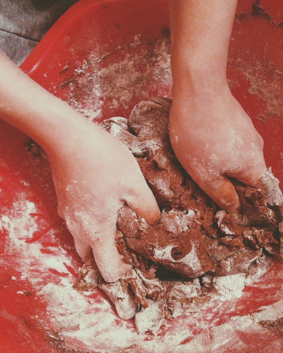 Once the mixture starts to thicken, knead the remaining dry ingredients into the dough.