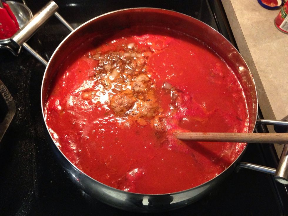 Once the onion and garlic are done, add them to the sauce. Use some water if necessary to get everything out of the pan and into the pot.