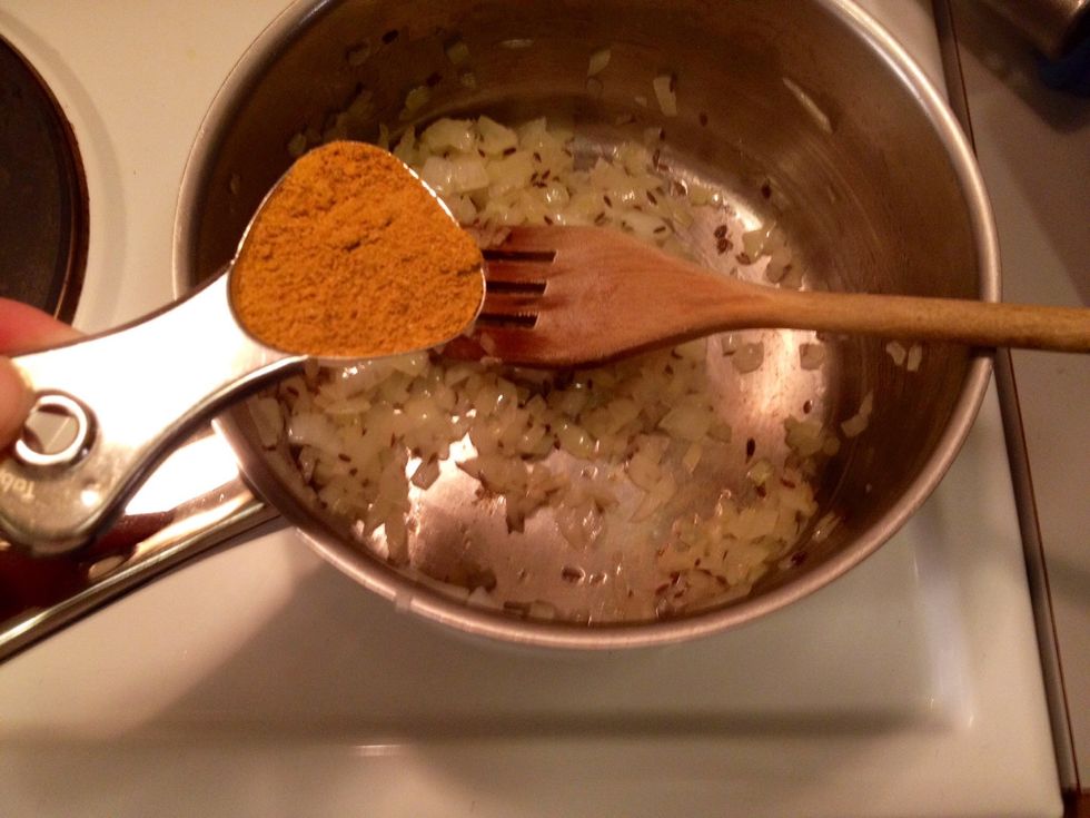 Once the onion is softened, add the Kay's spice mix.