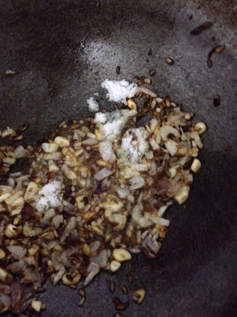 Once the onions are brown add salt