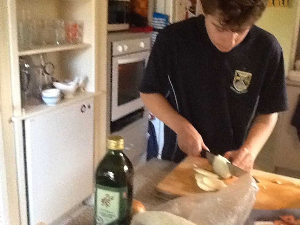 Once the onions are peeled, slice them as well.