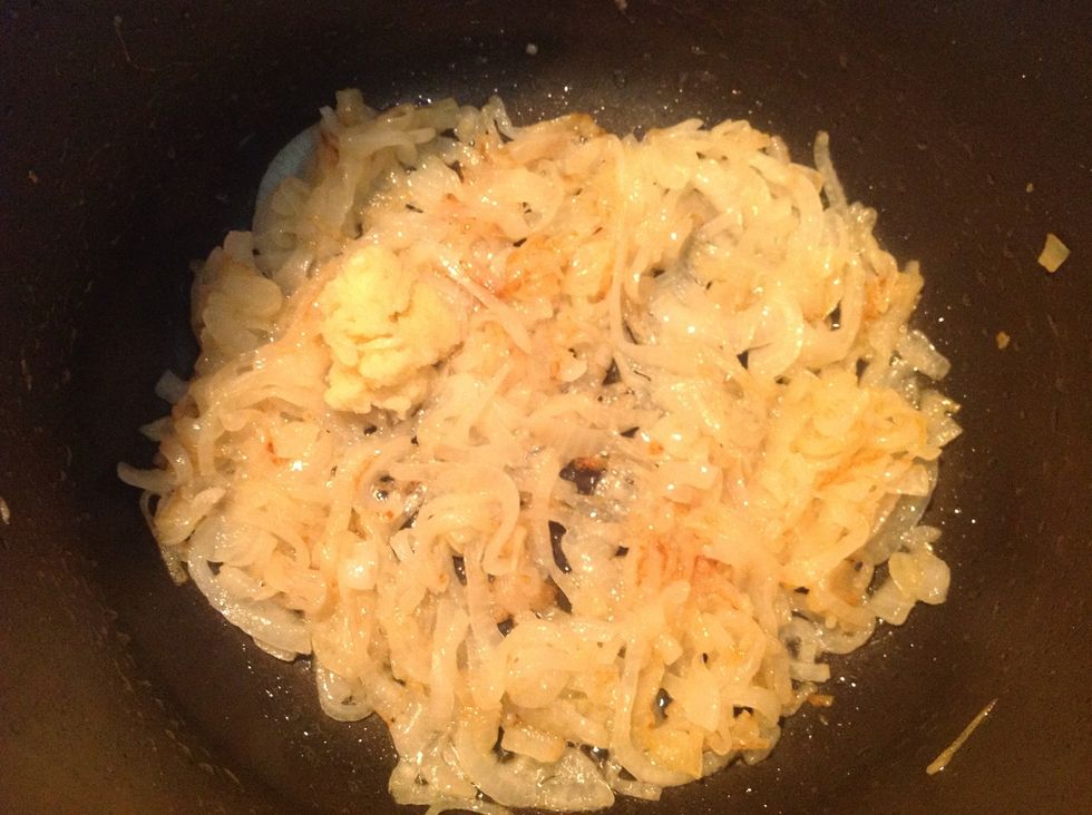 Once the onions are soft and starting to brown add the minced garlic and cook for a further couple of minutes.
