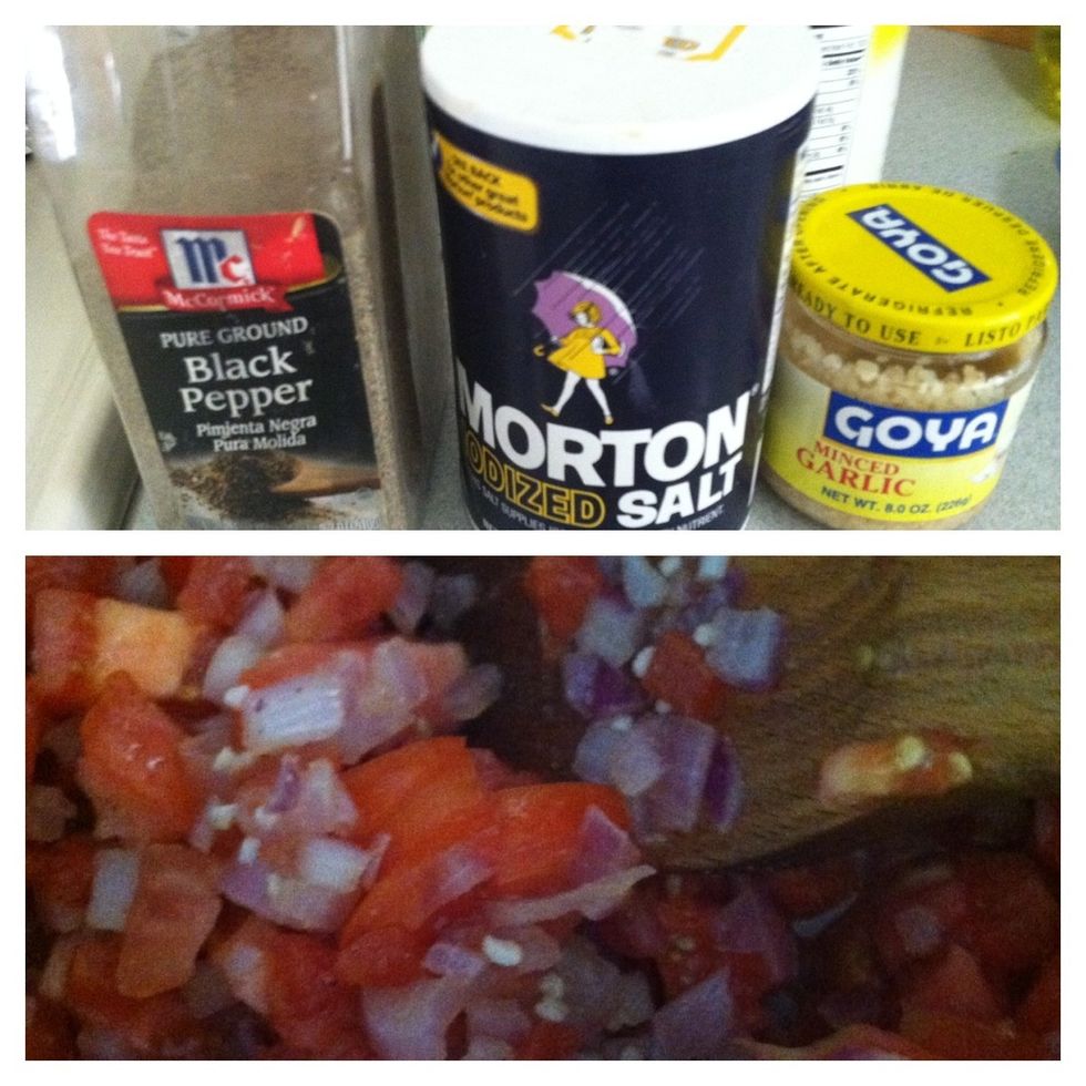 Once the onions have turned a little transparent. Add the black pepper, salt and minced garlic .  Then add the diced tomatoes.