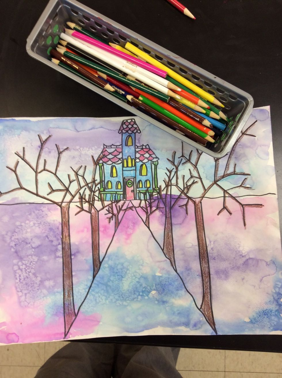 Once the paint is dry, scrape off the salt and use colored pencils to add emphasis to your winter house and trees