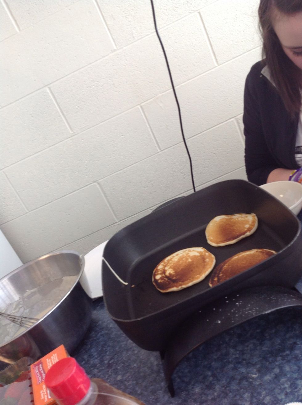 once the pancakes are light brown like this right here take them off of the burner.
