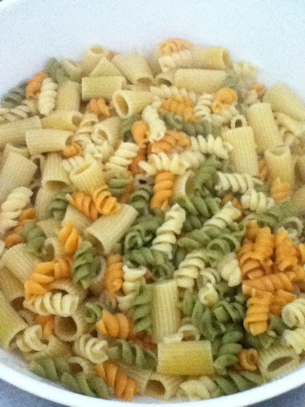 Once the pasta is done, place it in a strainer.