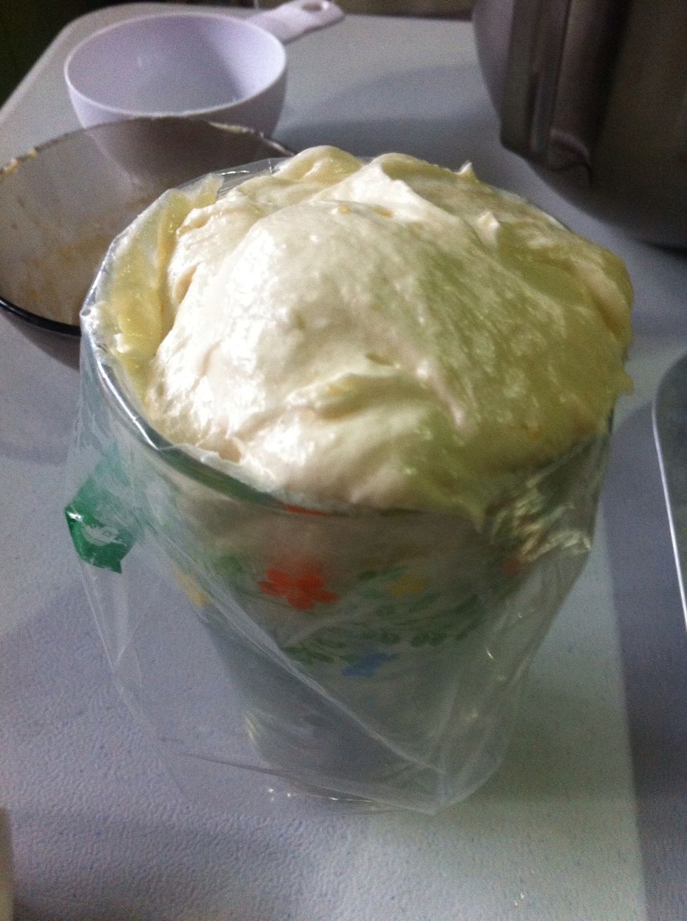 Once the pastry bag reached the glass mouth you can pull up the folded part of the pastry bag around the glass mouth so you can still fill up the bag depends to your need. :)