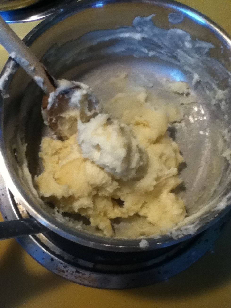 Once the play dough starts to become hard to stir, take it off the stove and  let it cool for a minute