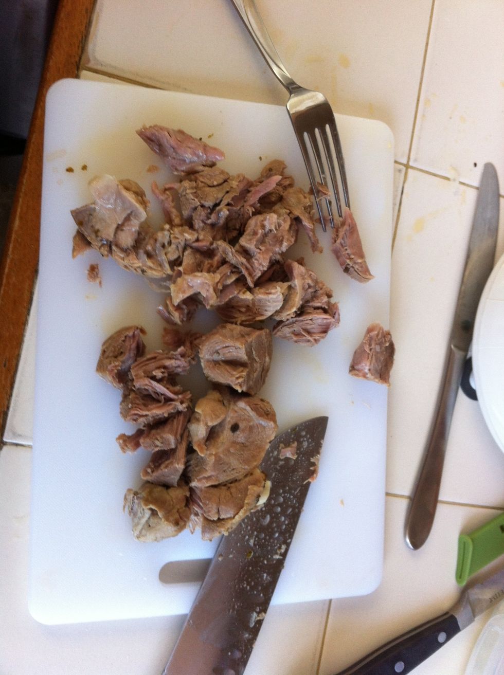 Once the pork is tender remove it and cut into chunks, or shred. I prefer chunks