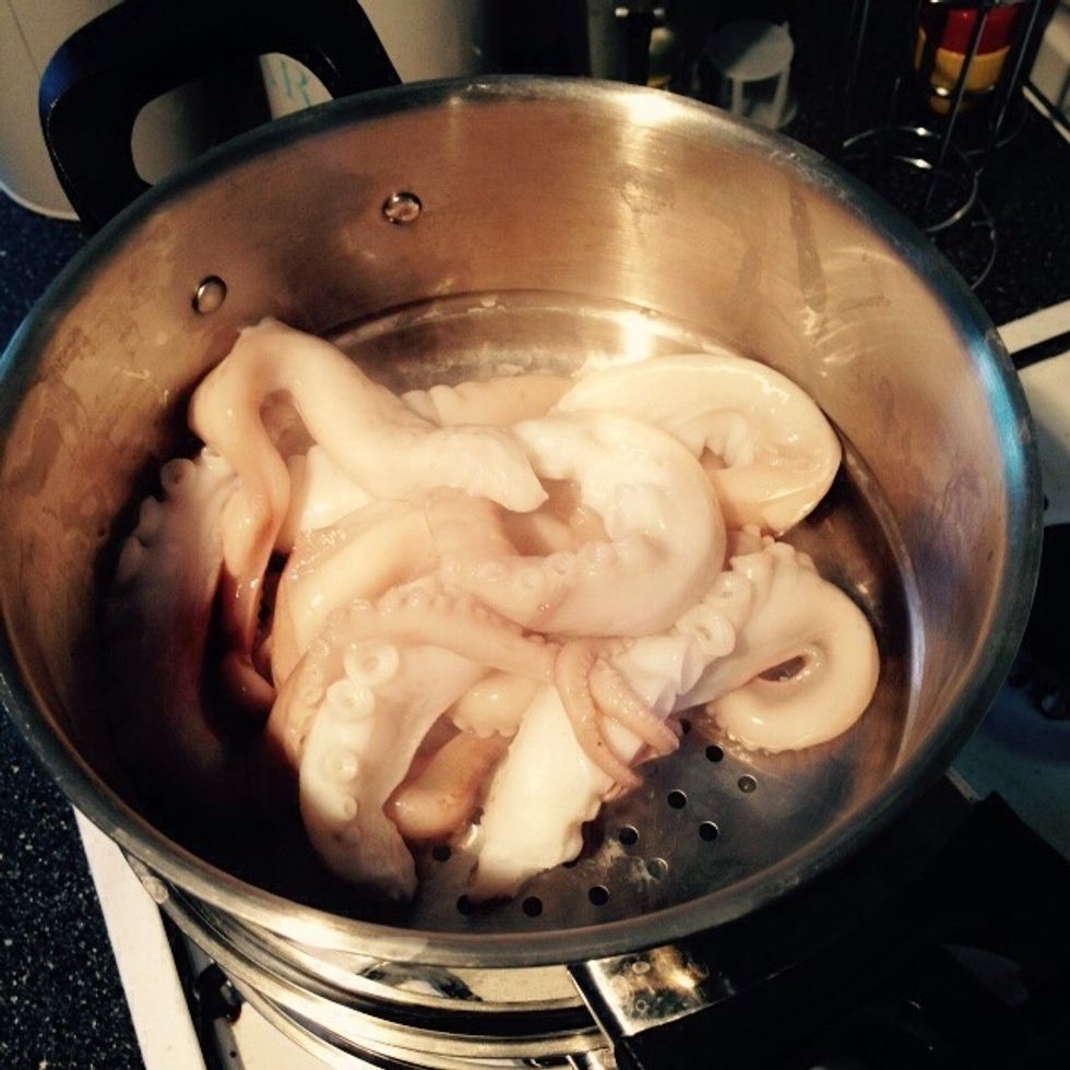 Once the potatoes are cooked, set them aside to cool. Cook the octopus in the tier steamer. Check it with a fork after 30-40min. It should be soft and not chewy.