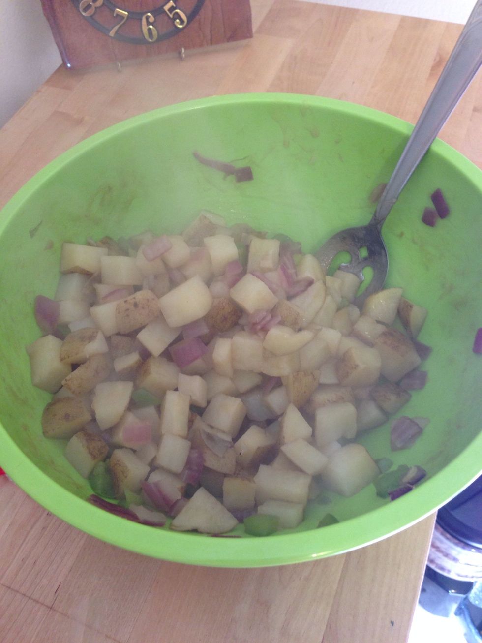 Once the potatoes are done, stir them one last time and drain any liquid.