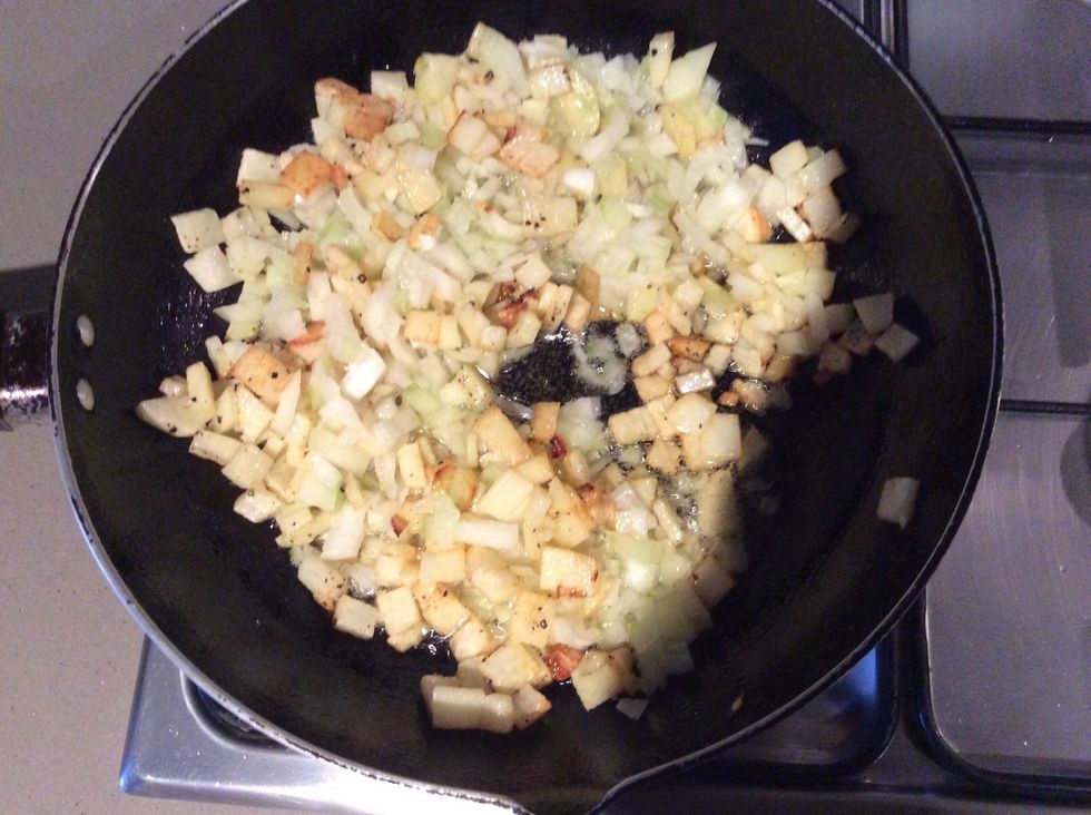 Once, the potatoes turn a light brown, then add onions and continue stirring the egg.