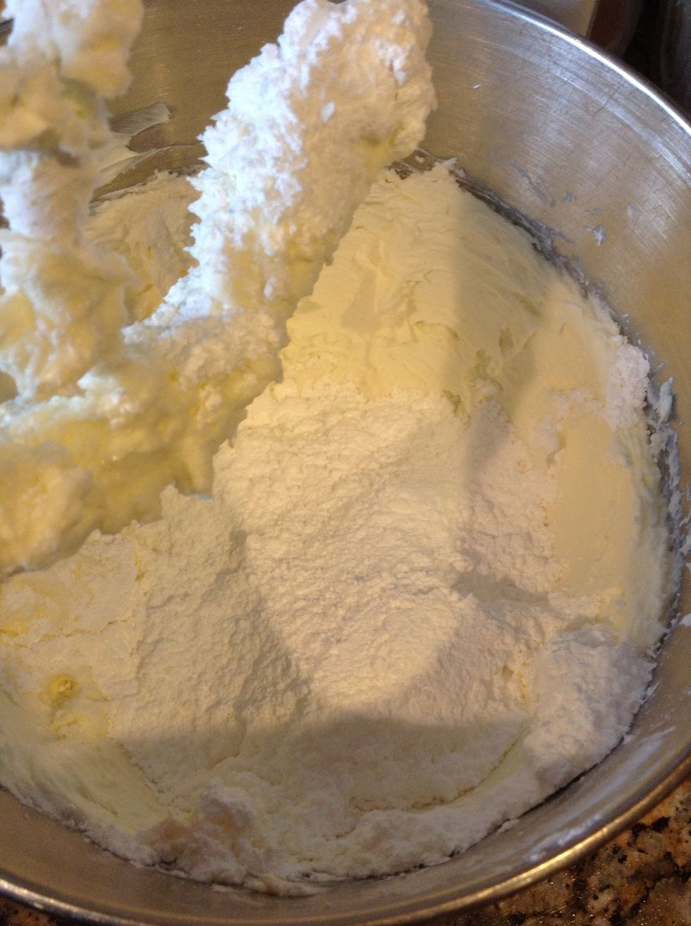 Once the pretzel crust has baked, allow to cool completely. Then, start the filling: 2- 8ounce cream cheese, 2 cups powdered sugar and 16 ounces whipped topping