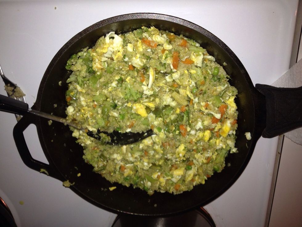 Once the quinoa is warm, mix the veggies into the skillet. You can add veggies as they are ready. I usually break up the big veggie chunks for a better texture.