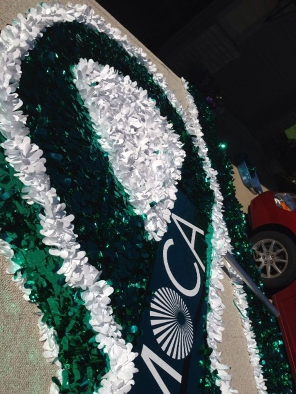 Once the ribbon is removed, it can be put back in the holding place.