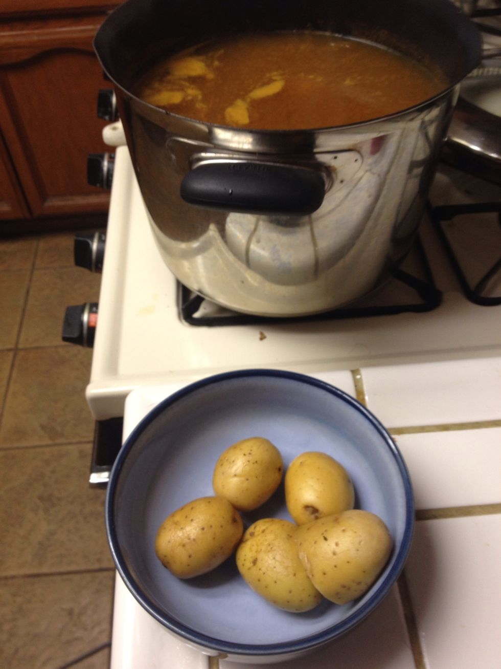 Once the sausage has boiled for 20 mins add the potatoes and boil for 15 mins.