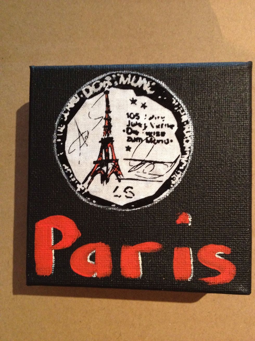 Once the scarlet paint is dry, highlight the lettering to make it "pop" against the black, using the Art Studio Size 1 Round Brush and the Unbleached Titanium .