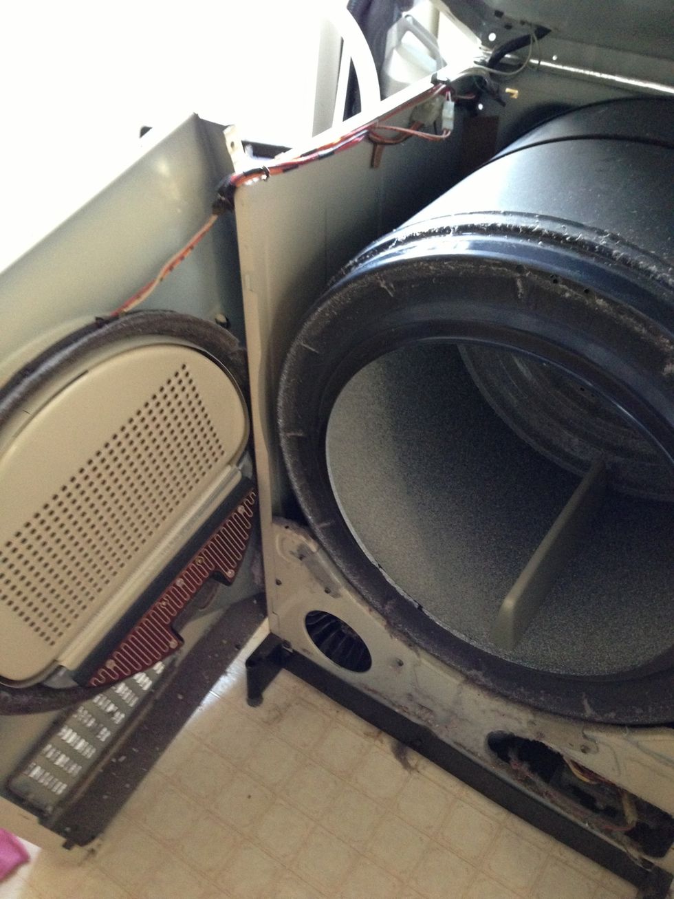 Once the side screws are removed, you should be able to swing the front section to the side. It'll be still attached by the wires so be careful.
