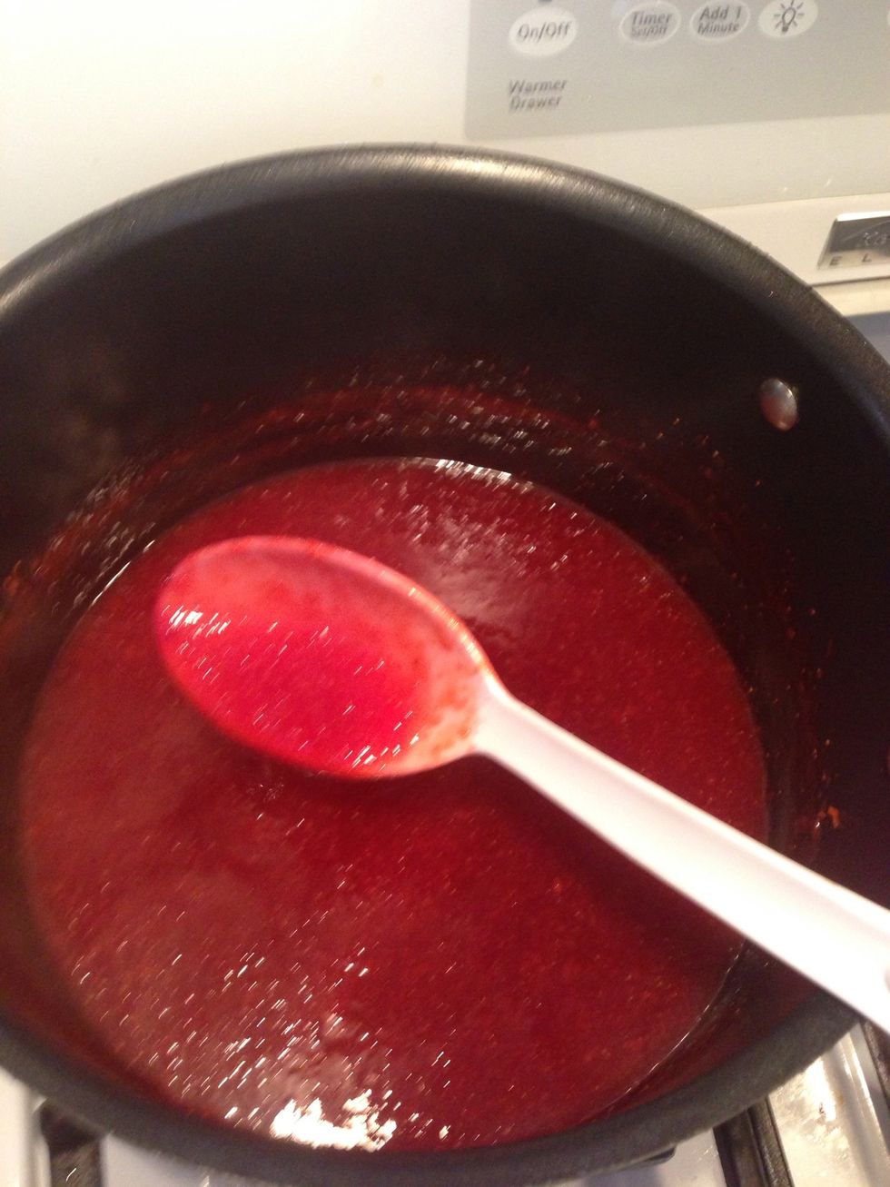 Once the sugar dissolves it will turn a nice ruby red color.