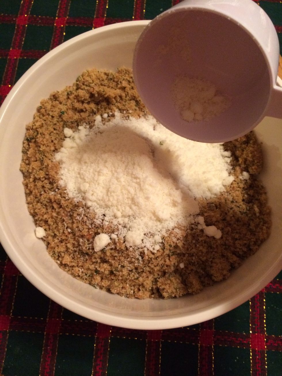 Once the toasted bread crumbs have cooled off, we will add the grated cheese in.\ud83d\ude0a