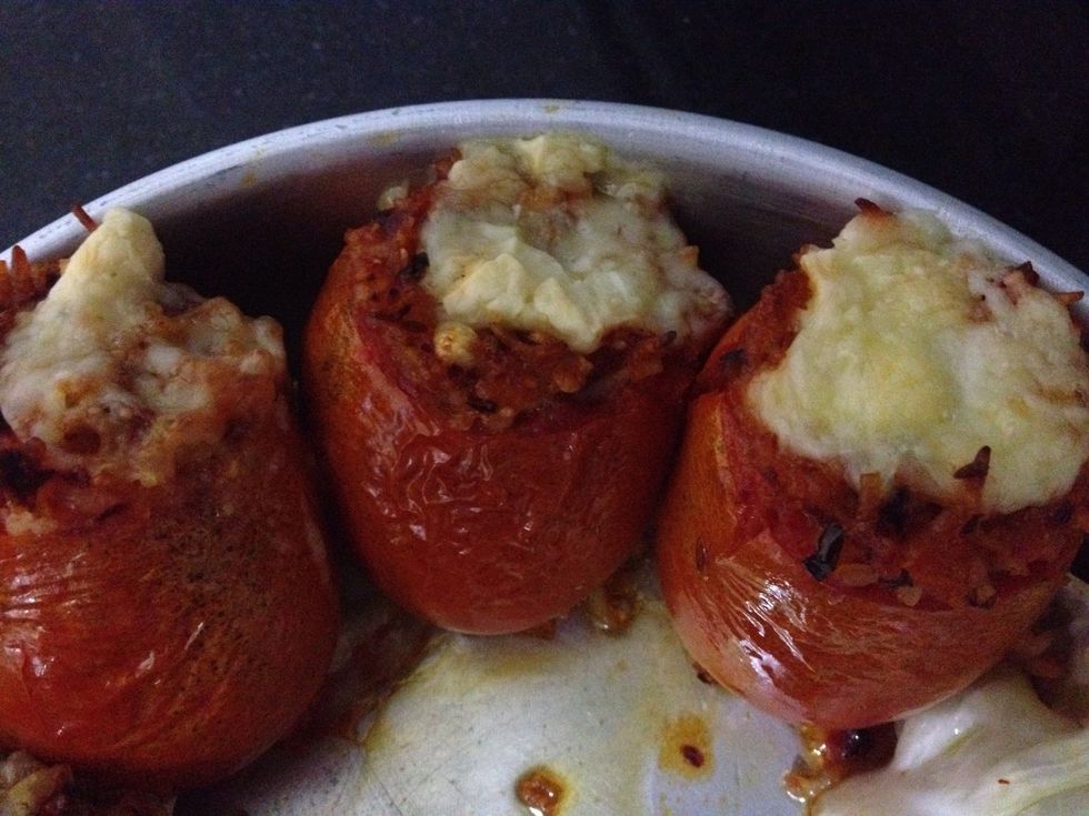 Once the tomatoes are half done put some cheese on it and put in oven for 5min till it melts. Total time in oven is around 10-14 min depending on size of tomatoes. using a knife to know if its done