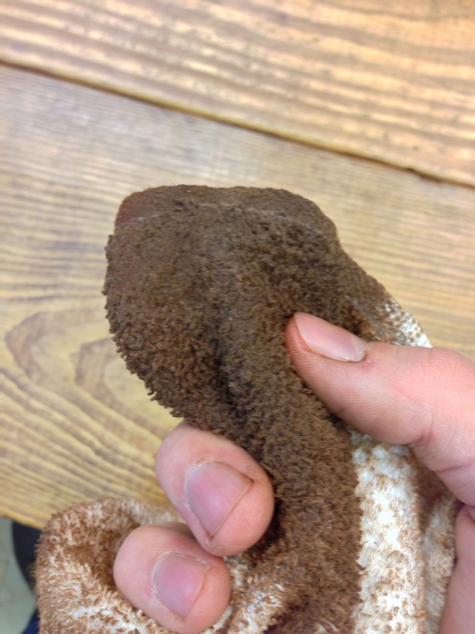 Once the top, sides and bottom edge are sanded and wiped off. You can start staining. I am using a stain called English Chestnut by Min-Wax. It's easily applied with an old rag.