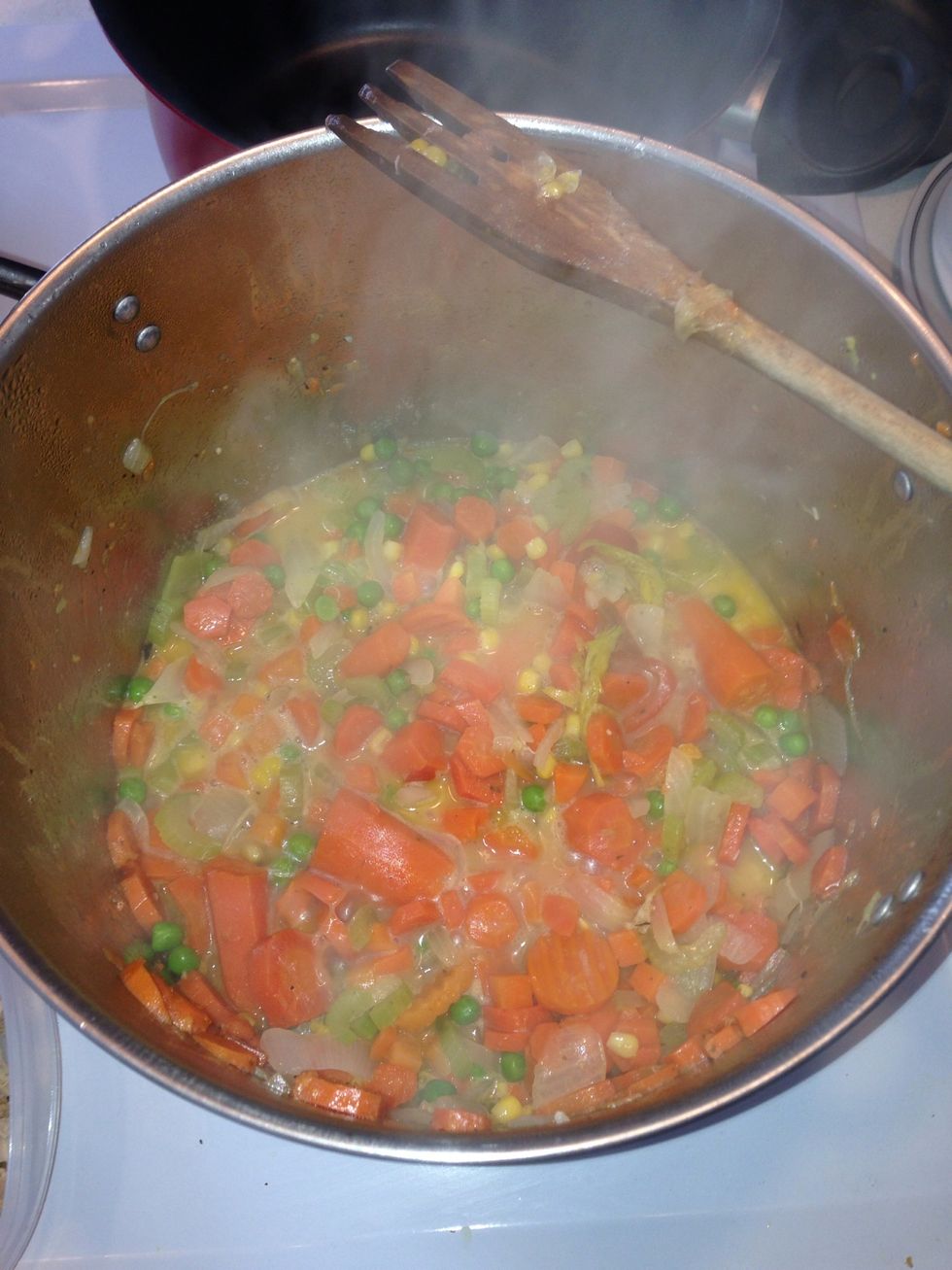 Once the vegetables are nice and steamy its time to add more