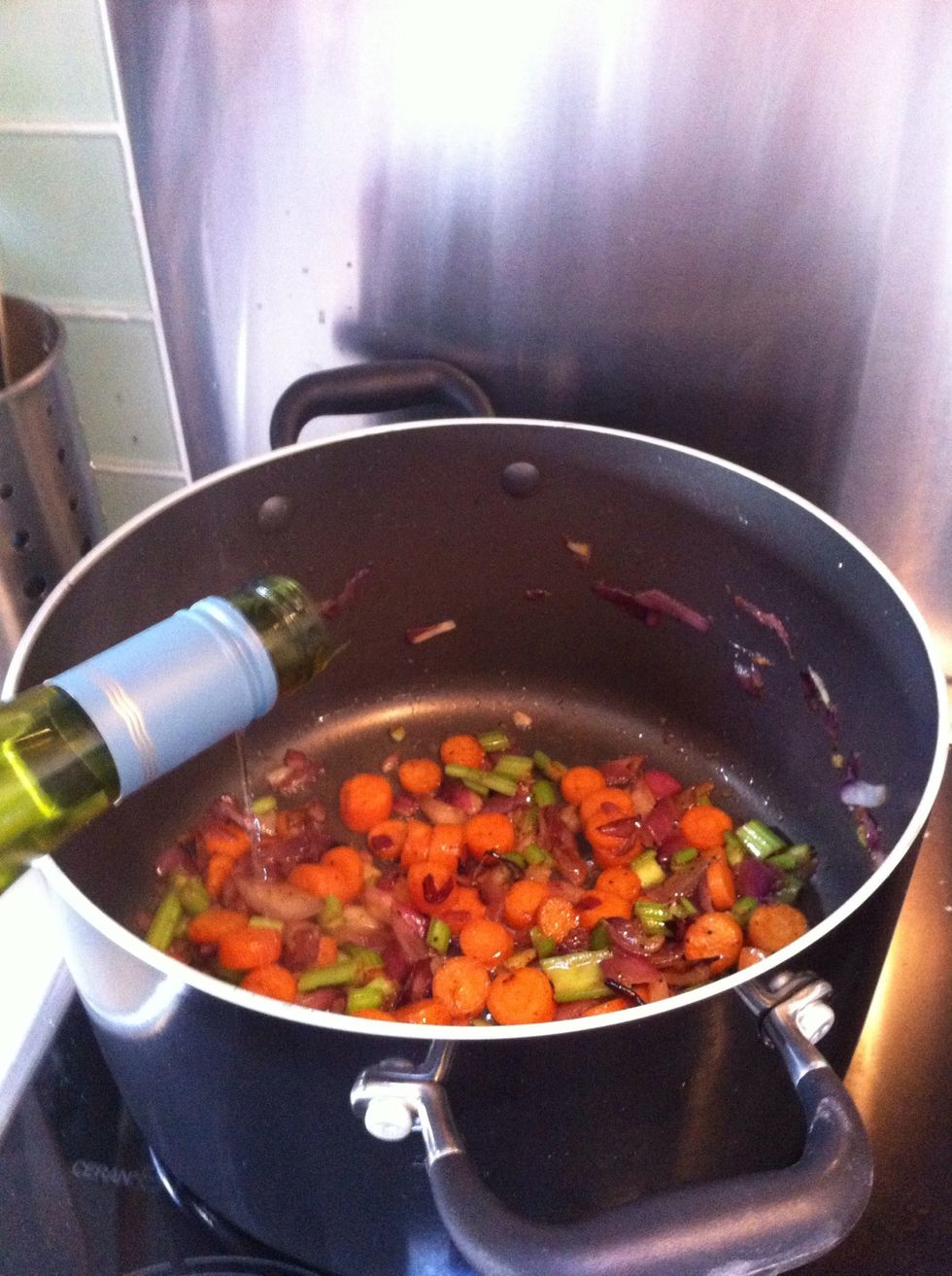 Once the vegetables have browned add white wine and let it evaporate for a few mins