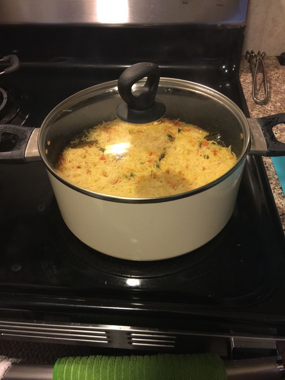 once the water has almost evaporated, cover the pot with a lid and cook on low flame for 5-7 minutes. till all the water has evaporated.