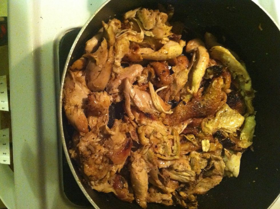 Once the water is gone break down the chicken to small pieces.