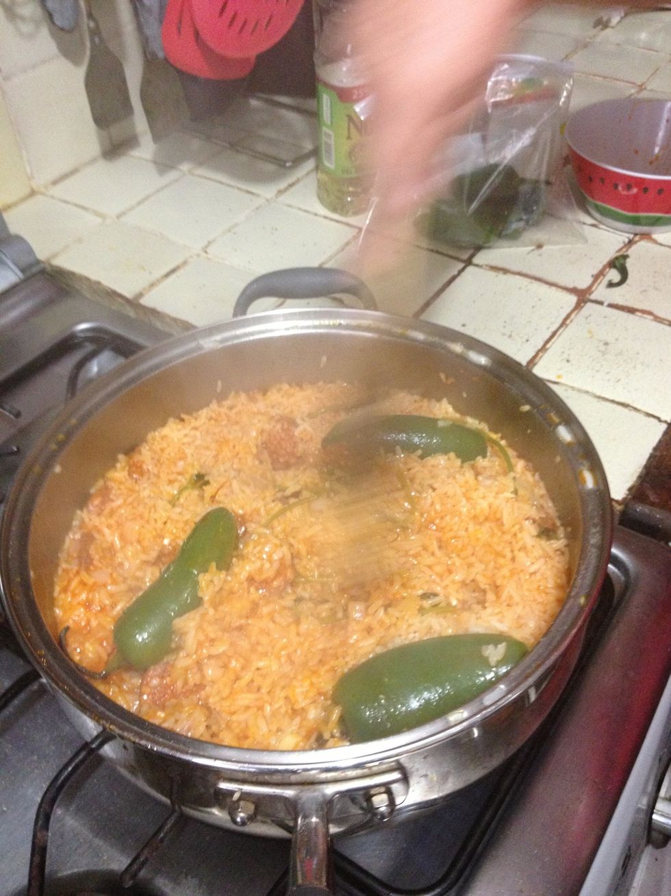 Once the water is gone, but the rice is still moist...