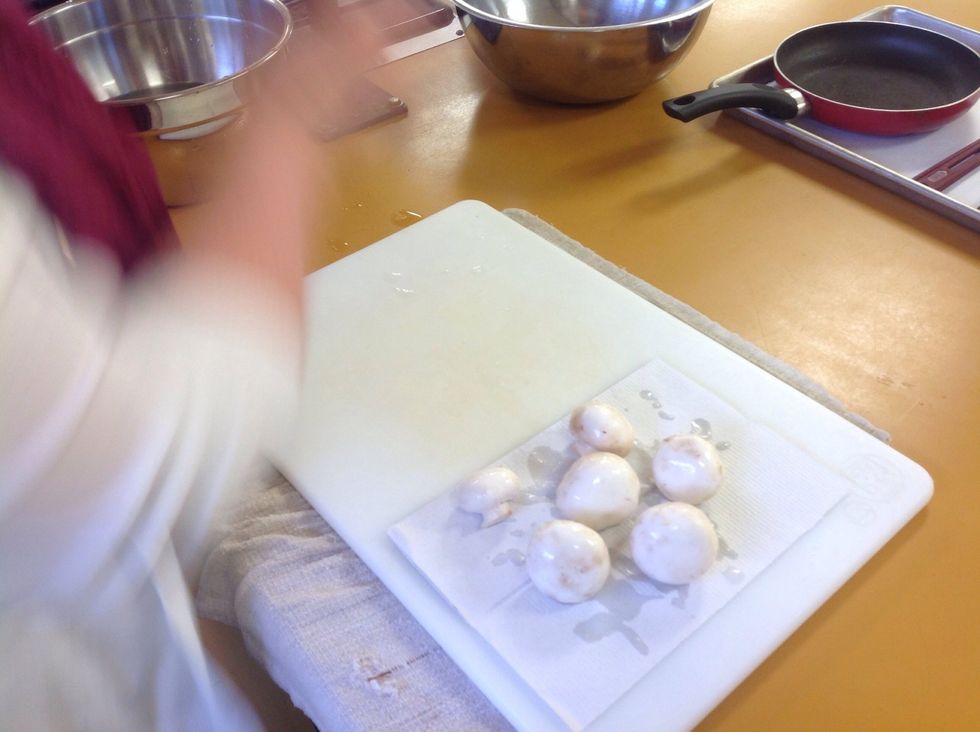 Once they are clean drop the mushrooms on to a few paper towels and dry them off.