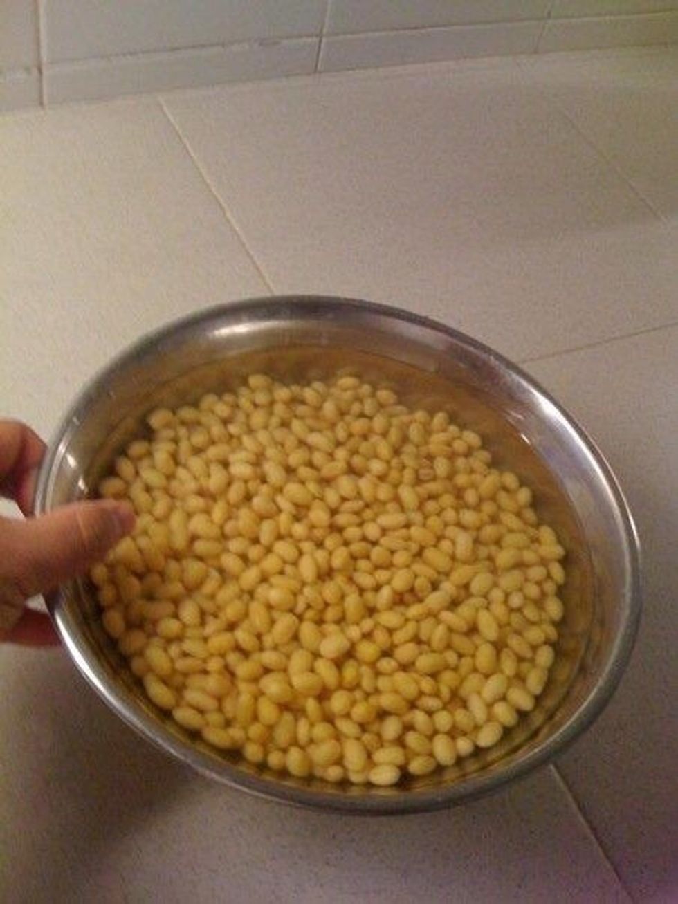 Once they have been left overnight, run through the beans to remove the outer 'skin' (painstaking process, but worth it)