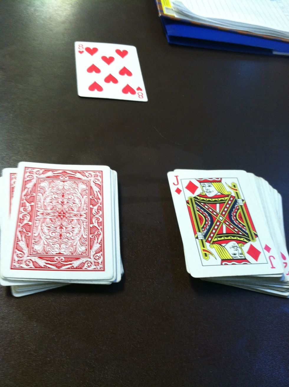 Once they have memorized their card, split the deck and half and have them put it face down on top. The trick to this trick is to memorize the card that will be next to theirs. Kind of sneaky.