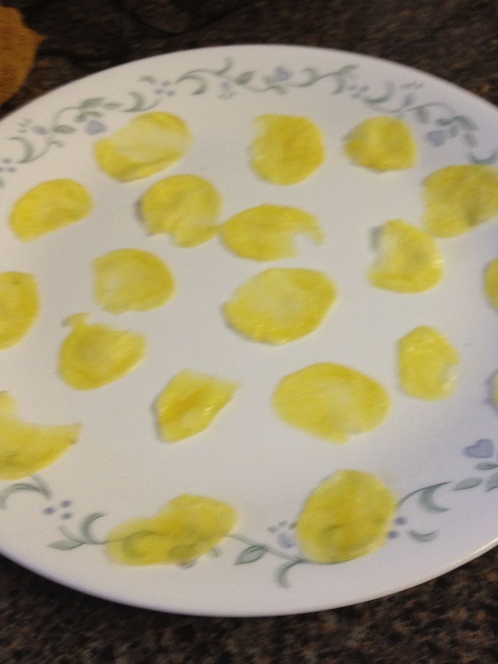 Once they turn a yellowish color and shrink noticeably, reduce the time to 45 seconds.