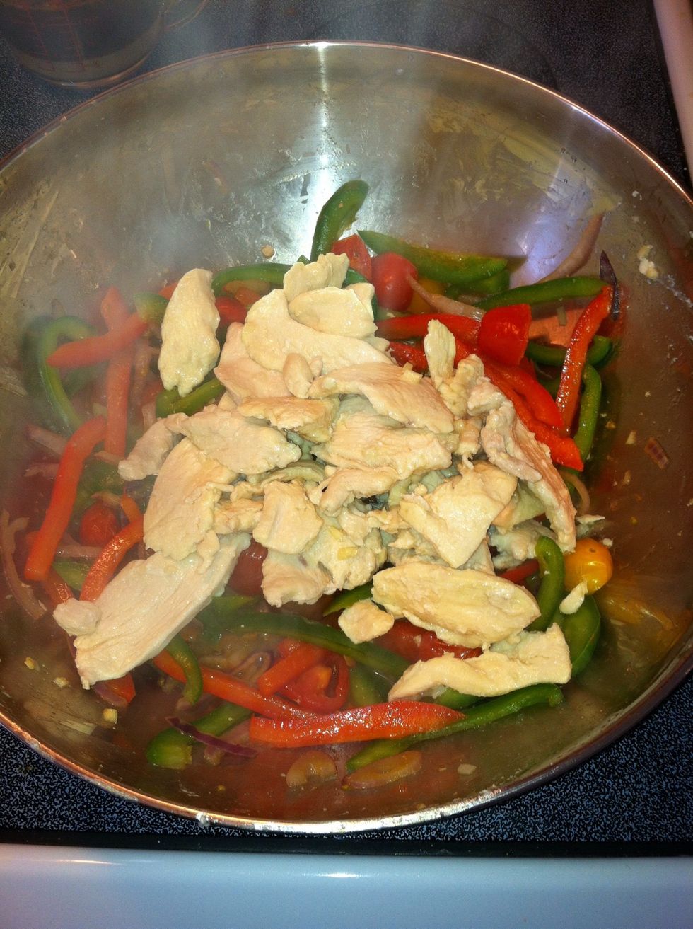 Once veggies are cooked tender crisp, or to your liking, add the chicken back in and stir.