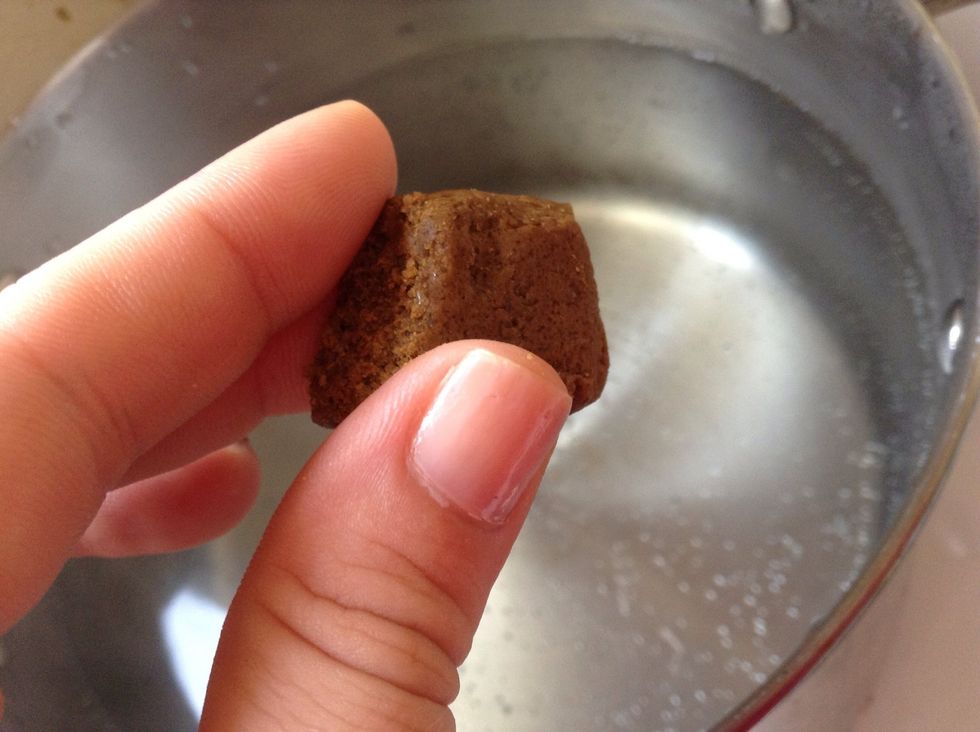 Once water warms up enough, dissolve vegetable cube in water (you could rather salt the water if preferred, but I find using cubes gives more flavor to boiled foods)