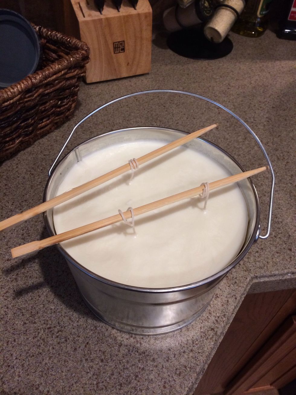 Once wax is set remove chop sticks.