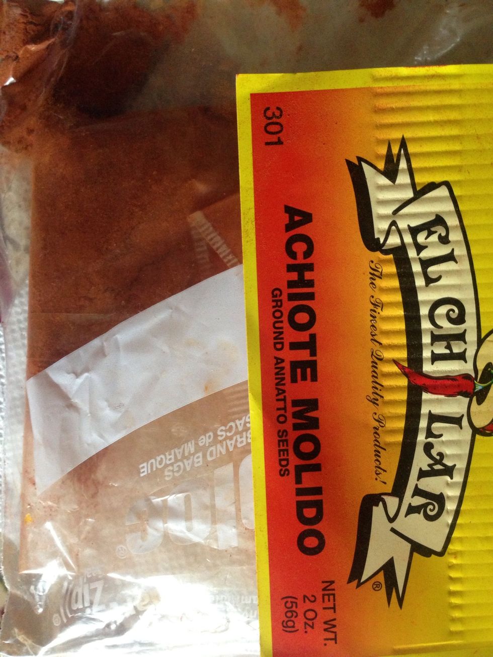 Once you are done filling, add your cayenne pepper or if you don't want the spice but like the pretty red looks use annato seeds powder or achiote.