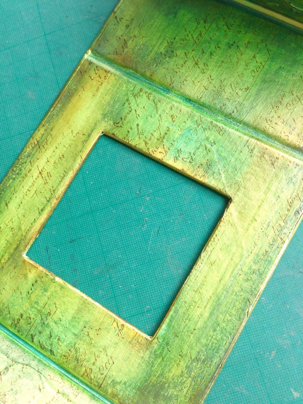 Once you are happy with the intensity, stamp the surface with randomly like what you've done on the exterior of the box...