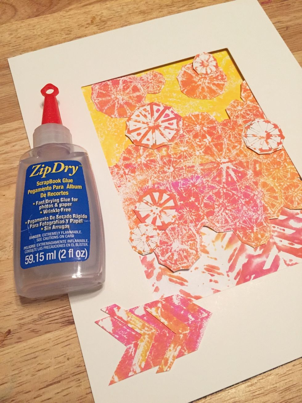 once you are happy with the placement of all pieces of your collage, glue them to the front and back of mat with Zip Dry.