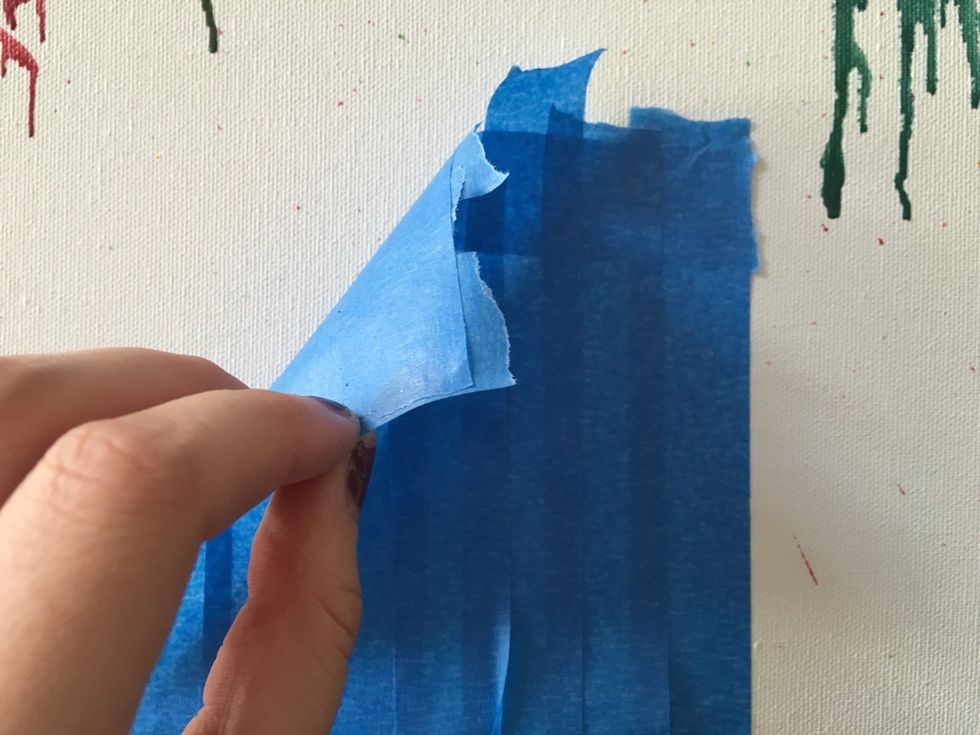 Once you are happy with the way your crayons have melted, then remove the tape you placed on the canvas.